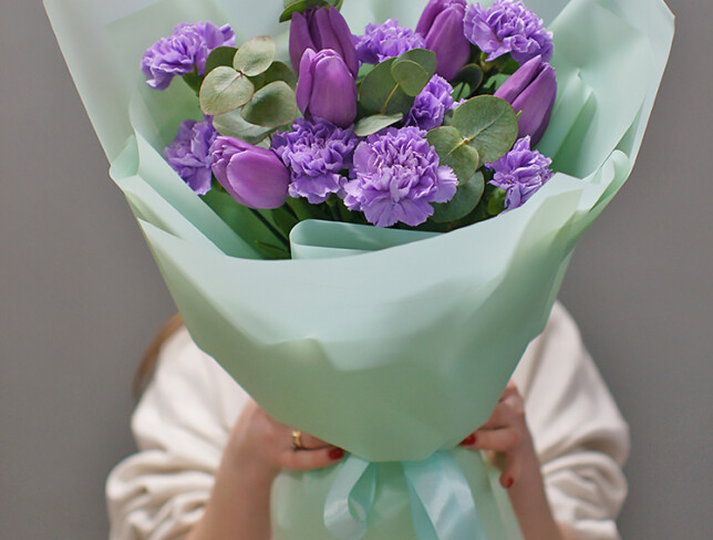 Bouquet with purple tulips and carnations